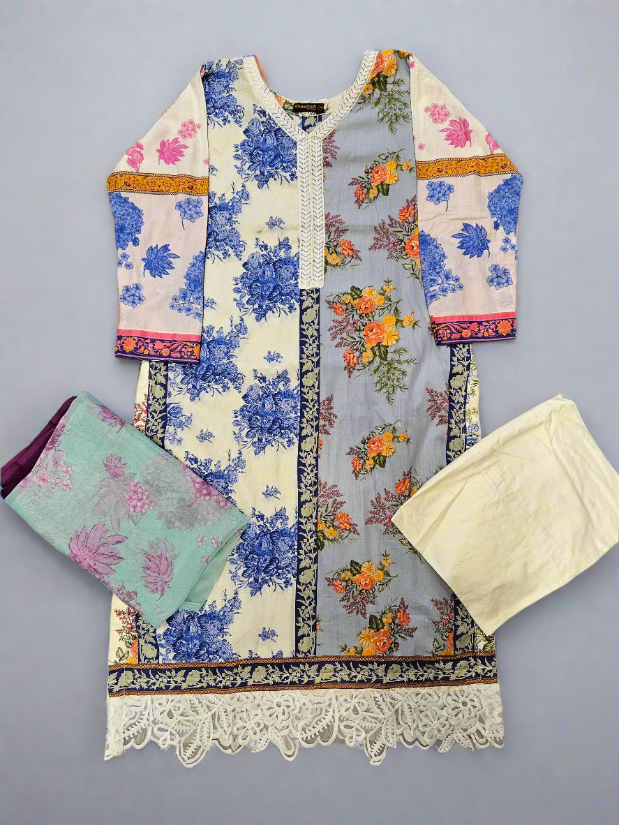 Floral patterned garment with lace trim on a wooden surface
