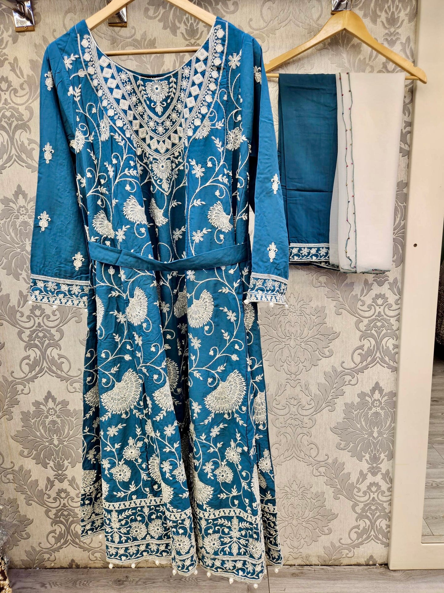 Sapphire blue and white colour thread all over embroidery