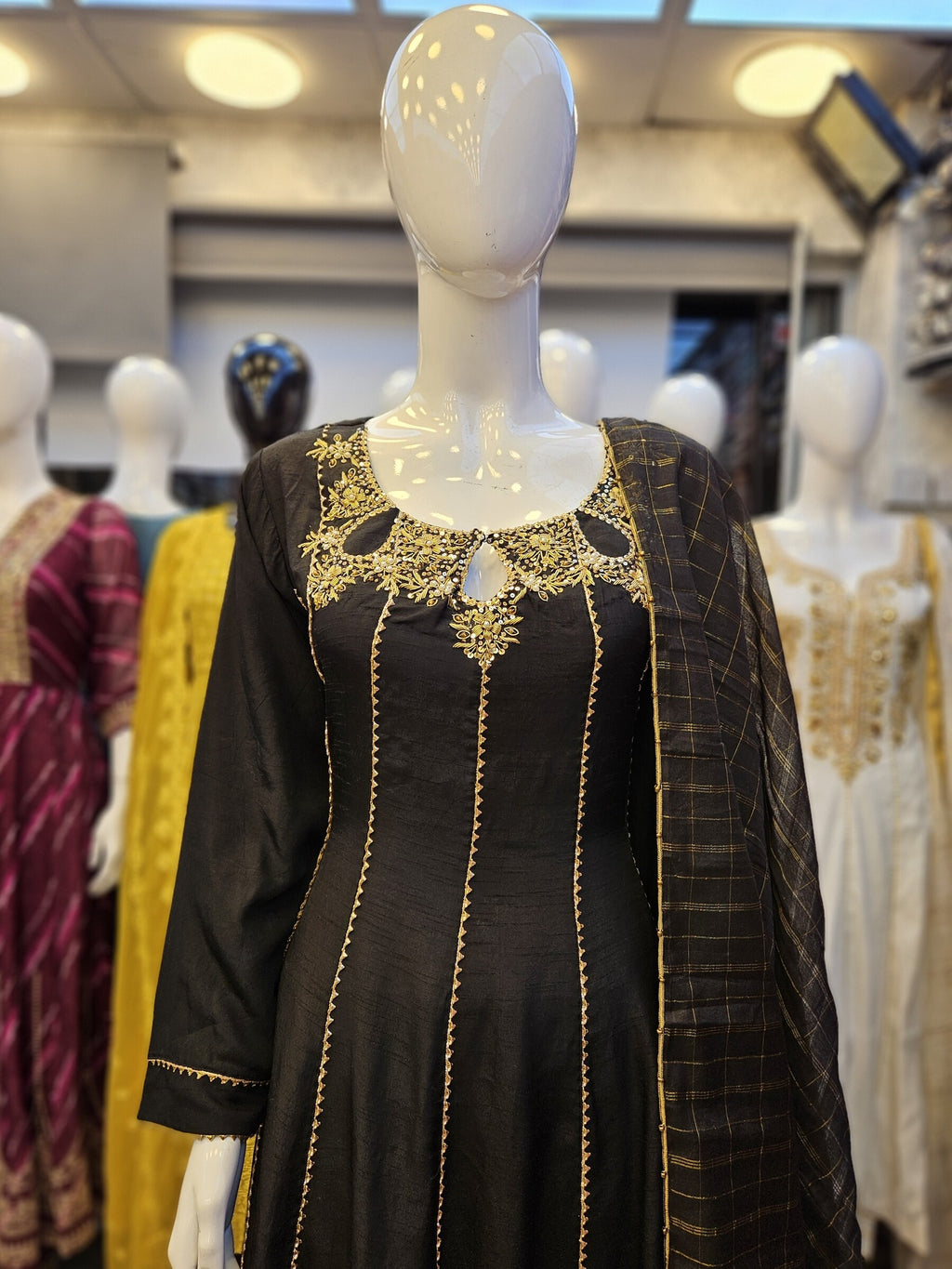 Black with antique gold colour hand embellished raw silk