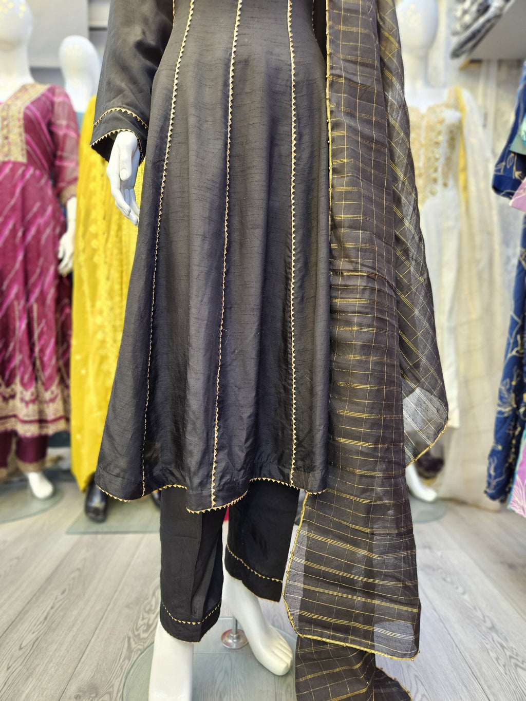 Black with antique gold colour hand embellished raw silk