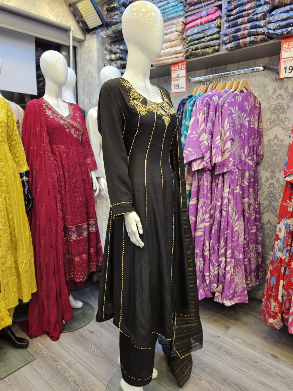 Black with antique gold colour hand embellished raw silk