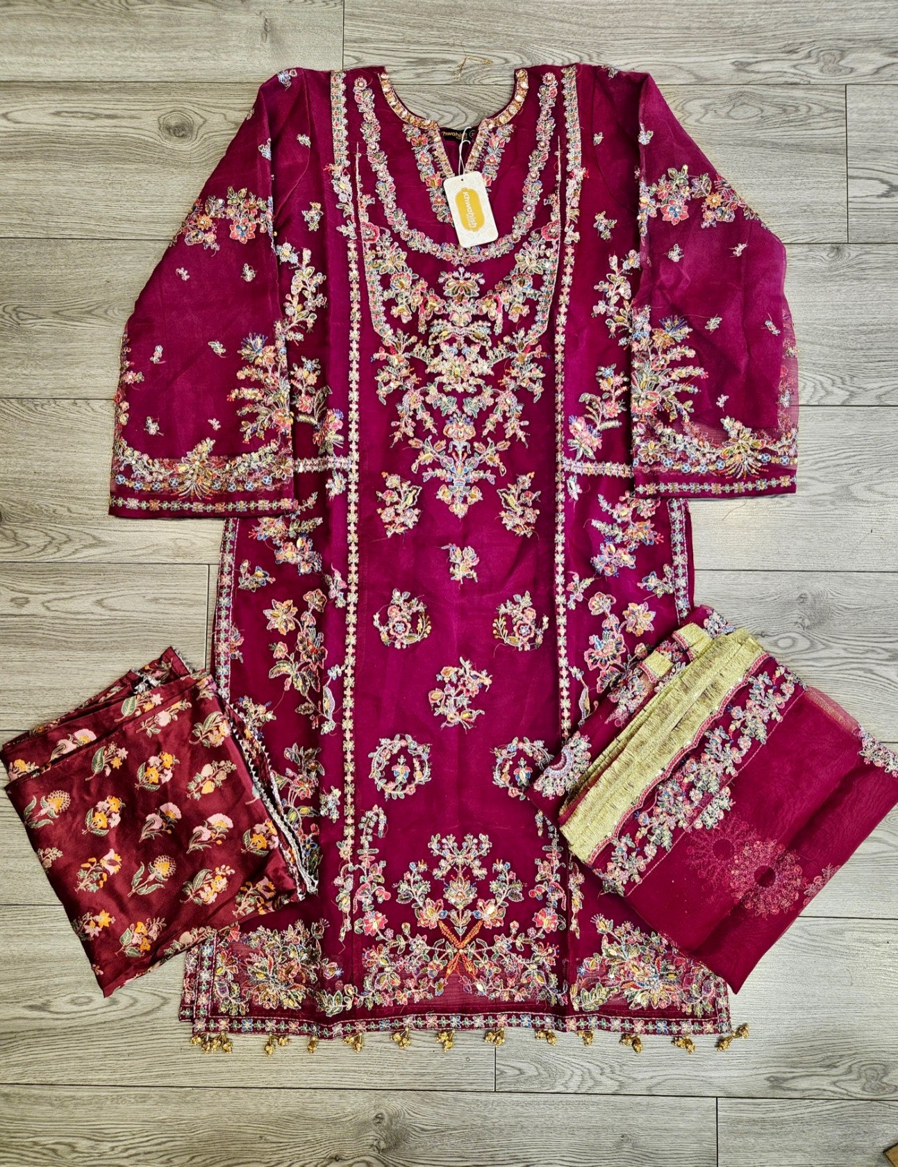 HUSS ruby plum and gold colour luxury hand embellished kameez and sharara