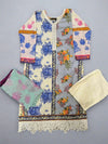 Floral patterned garment with lace trim on a wooden surface