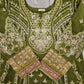 Green embroidered garment with intricate patterns and a visible brand label.