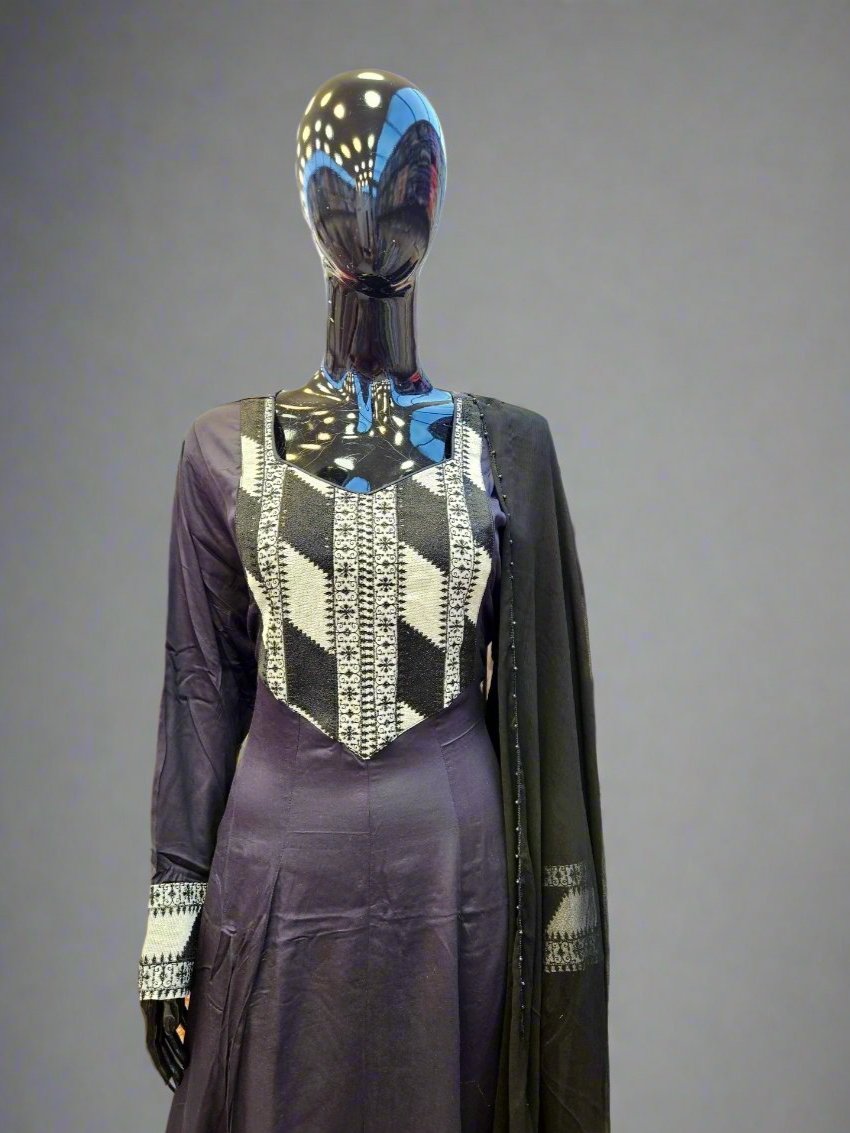 Black with white embroidery on neck and border marina winter fabric