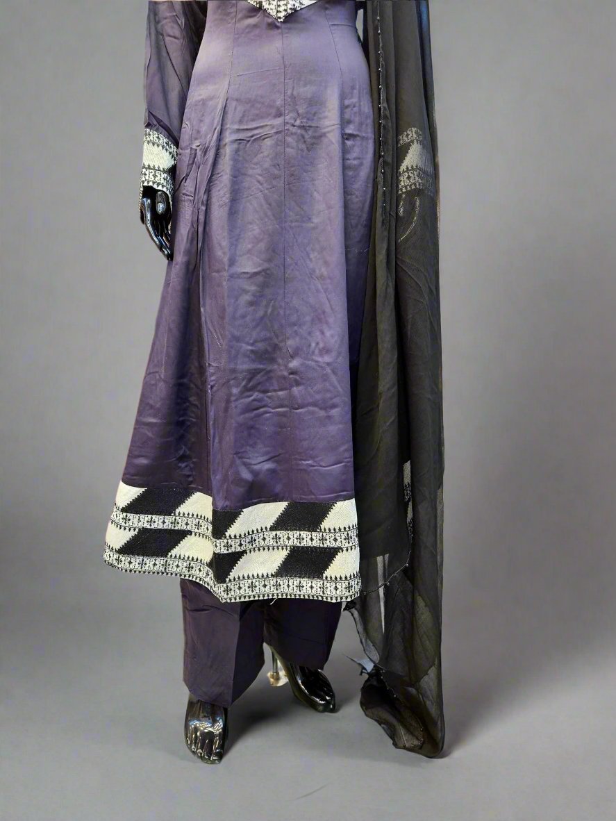 Black with white embroidery on neck and border marina winter fabric