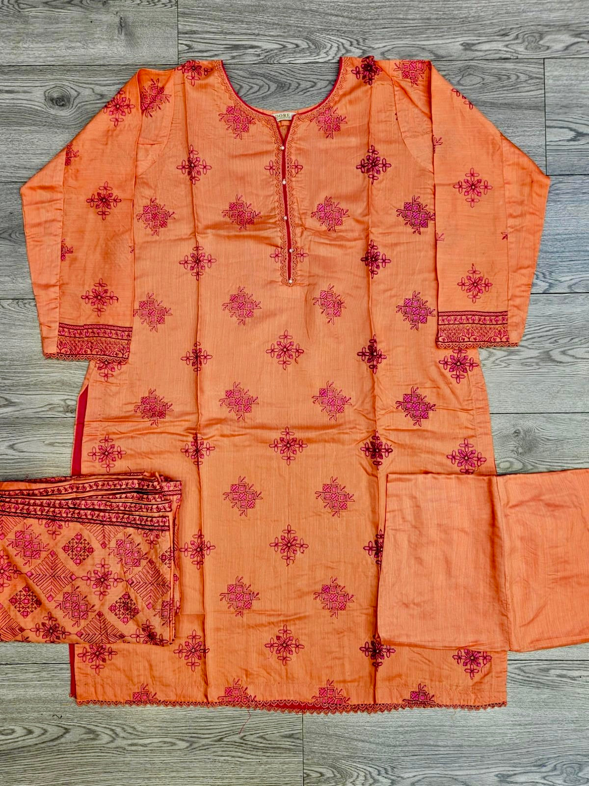 ANM by Ali coral colour thread embroidered