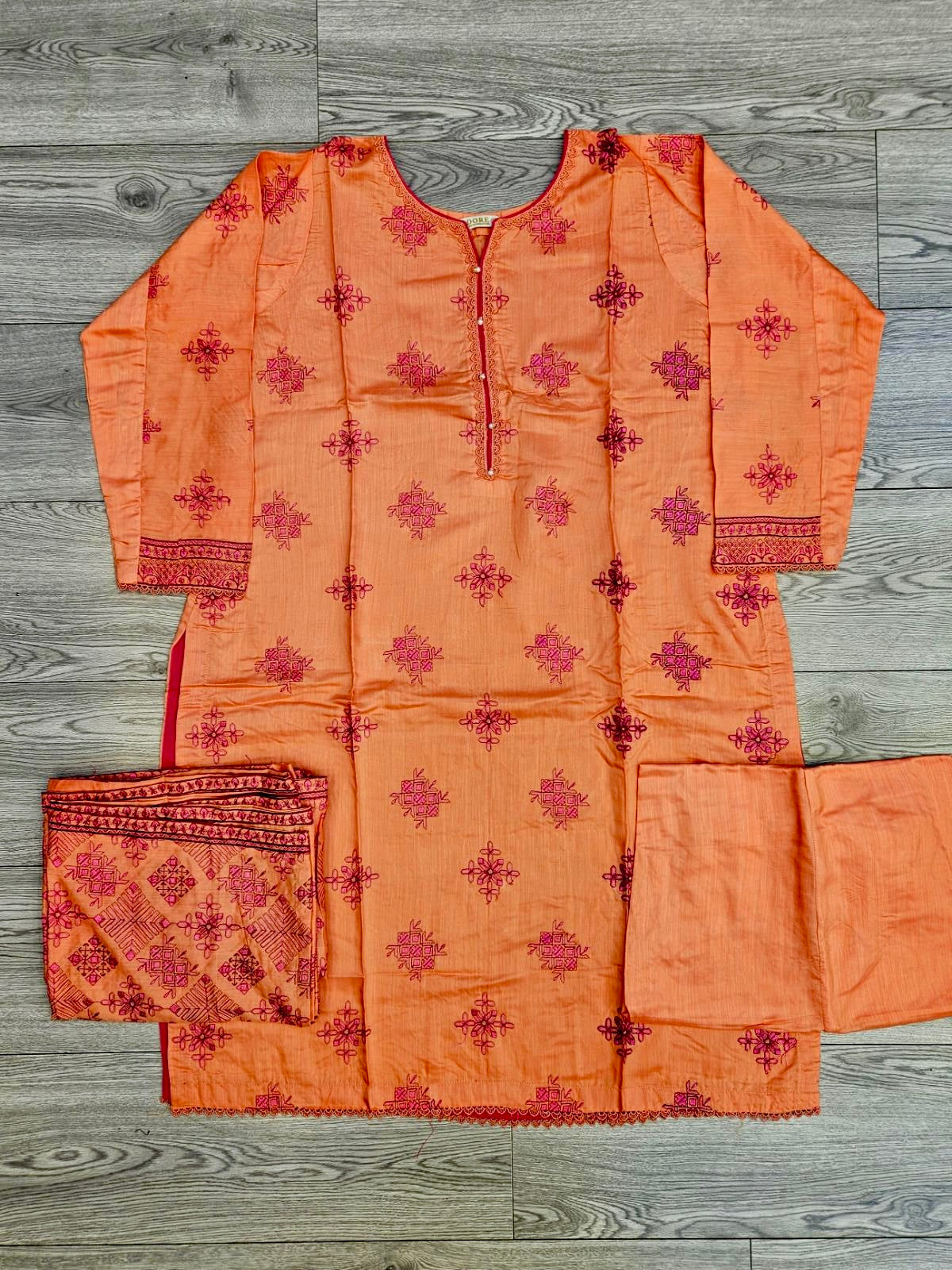 ANM by Ali coral colour thread embroidered