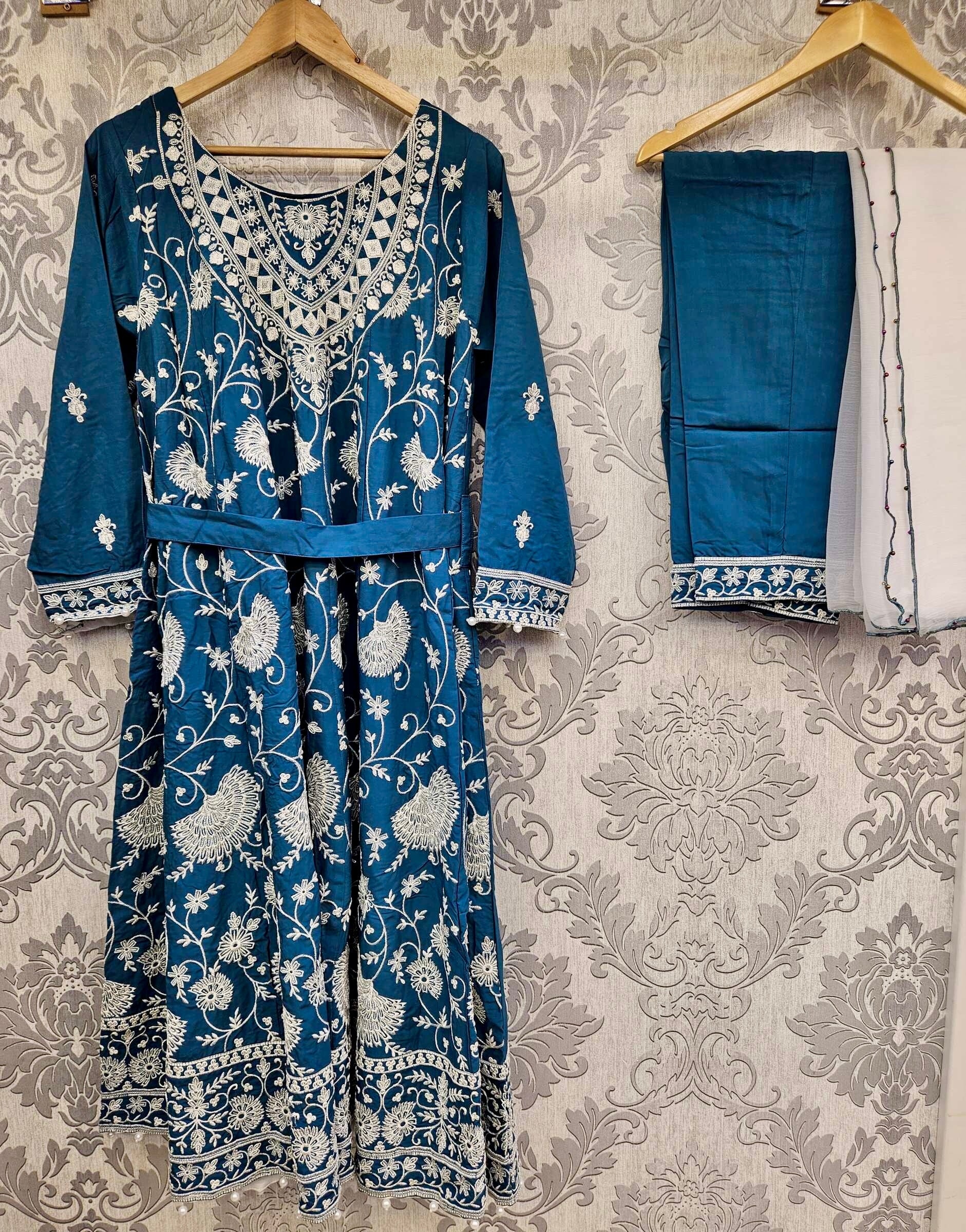 Sapphire blue and white colour thread all over embroidery