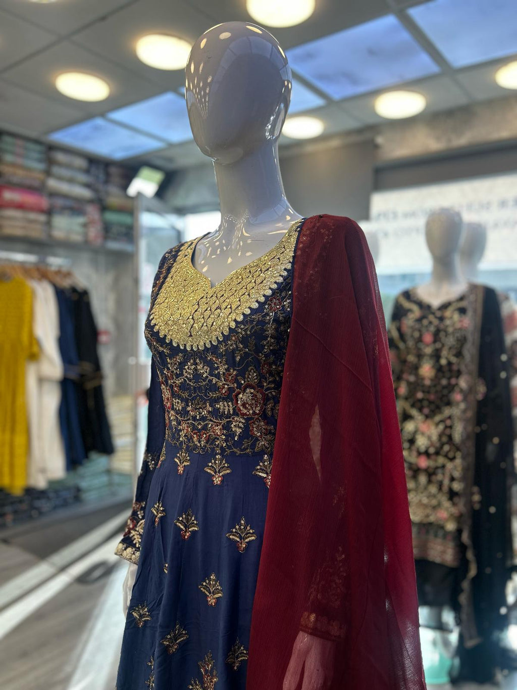 Navy blue with antique gold and red colour