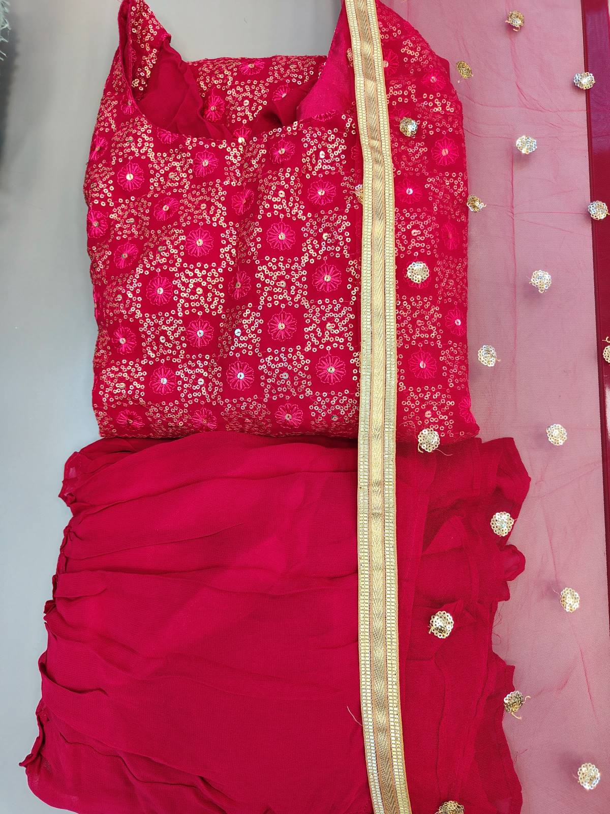 SM hot pink colour georgette fabric sharara suit with chiffon sharara and net dupatta in size medium womenswear traditional dress